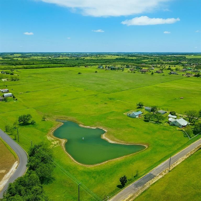 2196 Bledsoe Road Gunter, TX 75058 - Photo 28 of 33 a view of a golf course with a building