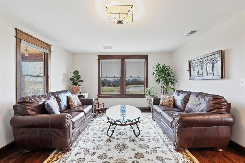 2196 Bledsoe Road Gunter, TX 75058 - Photo 7 of 33 a living room with furniture and a large window