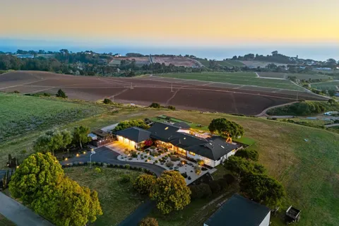 a view of a swimming pool with a lake view