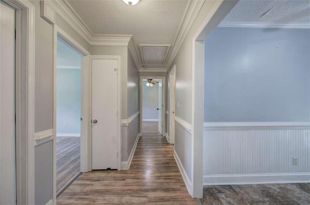 60 Lee Street Rockmart, GA 30153 - Photo 3 of 21 a view of a hallway with wooden floor