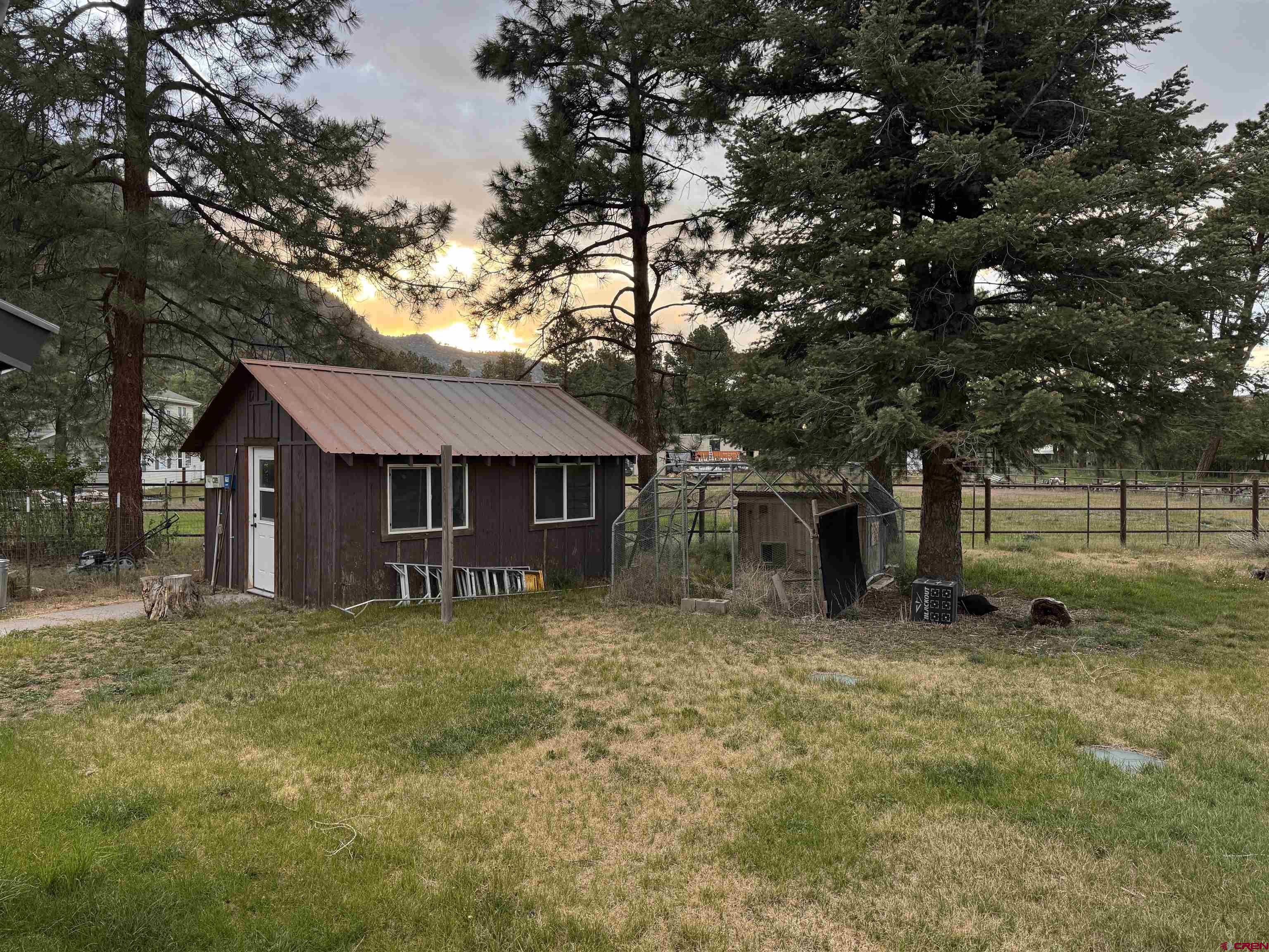 559 Suzanne Lane Ridgway, CO 81432 - Photo 41 of 45 a view of a house with a yard