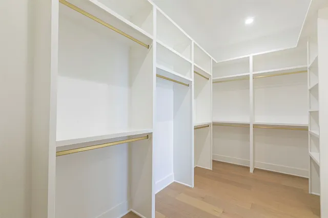 a view of an empty walk in closet