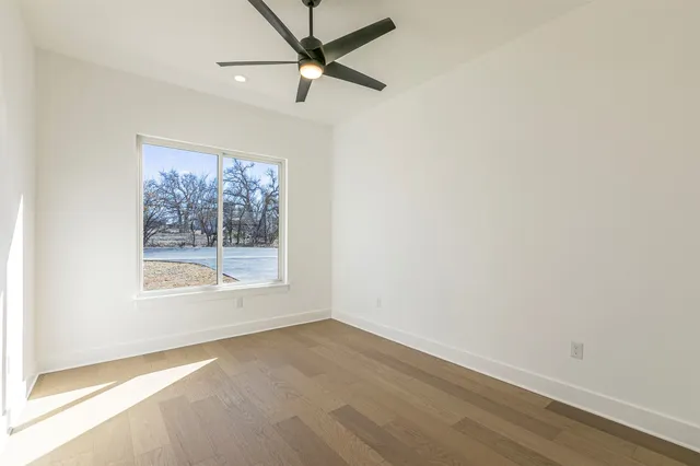 a view of an entryway with wooden floor and stairs