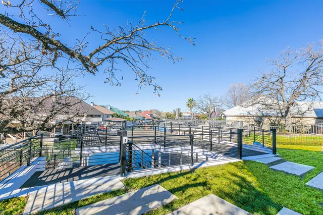an aerial view of a house with a ocean view