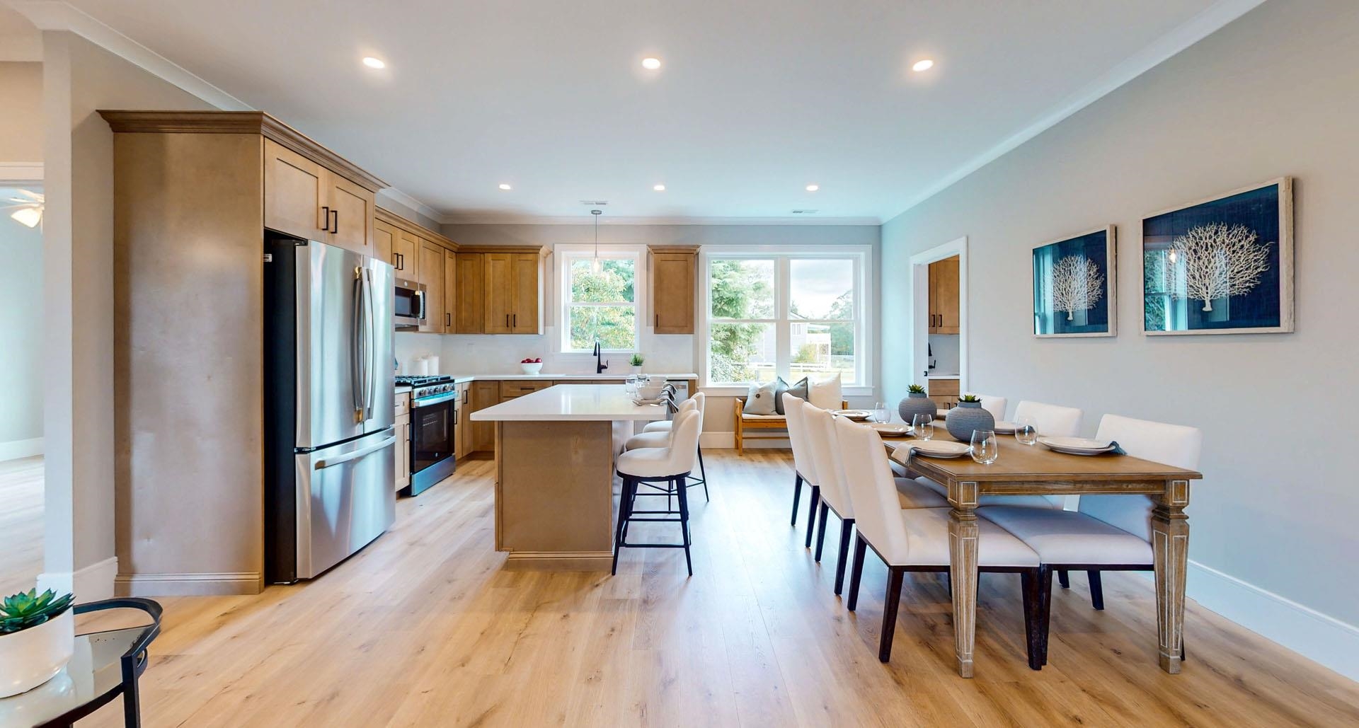 1729 Shore Ocean View, NJ 08230 - Photo 13 of 36 a kitchen with sink a refrigerator a table and chairs