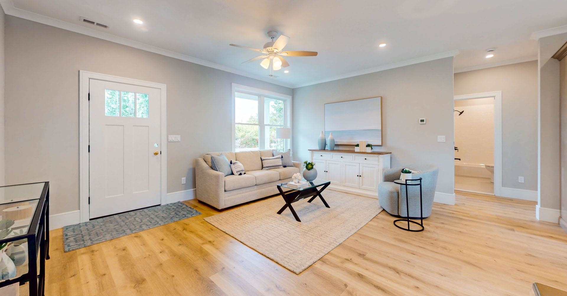 1729 Shore Ocean View, NJ 08230 - Photo 2 of 36 a living room with furniture and a chandelier