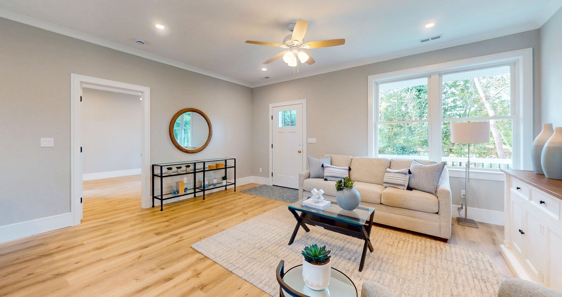 1729 Shore Ocean View, NJ 08230 - Photo 3 of 36 a living room with furniture a rug potted plant and a large window