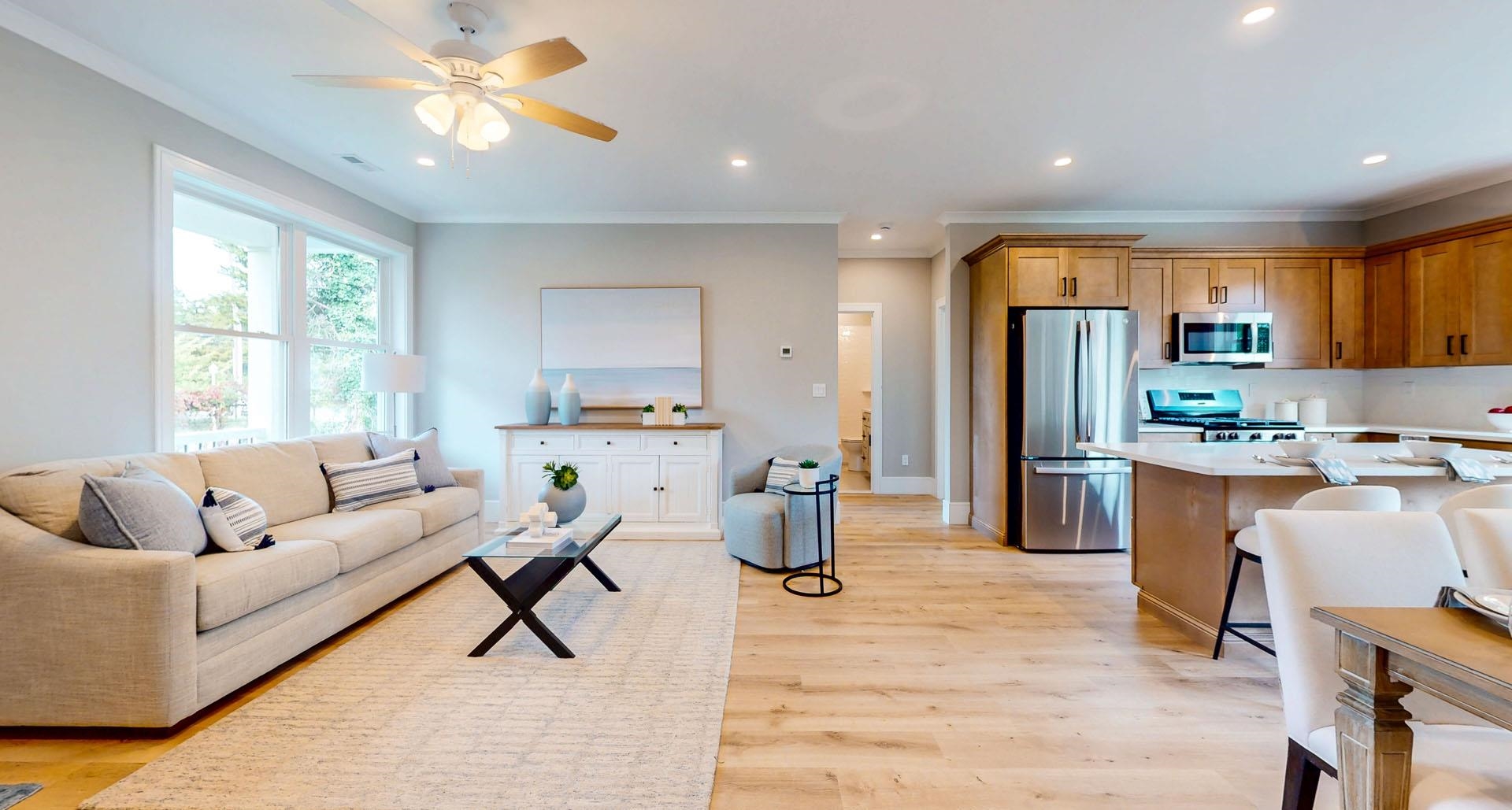 1729 Shore Ocean View, NJ 08230 - Photo 5 of 36 a living room filled with furniture and kitchen view