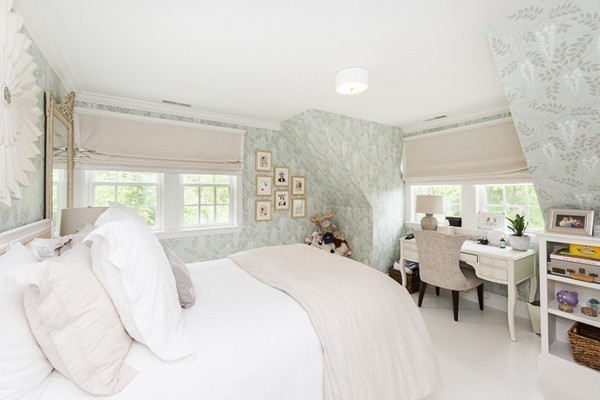 25 Forest Street Manchester, MA 01944 - Photo 16 of 24 a bedroom with a bed and a chair