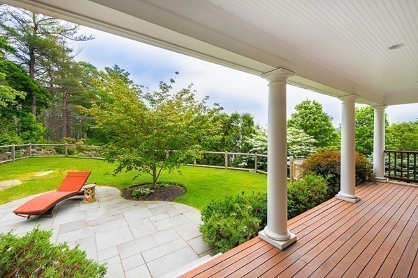 25 Forest Street Manchester, MA 01944 - Photo 23 of 24 a view of backyard with swimming pool and outdoor seating