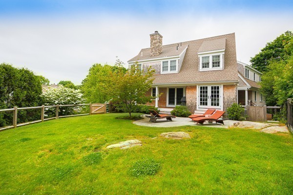 25 Forest Street Manchester, MA 01944 - Photo 24 of 24 a view of a house with a yard porch and sitting area