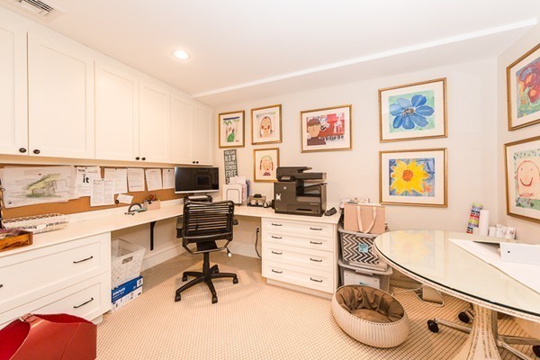 25 Forest Street Manchester, MA 01944 - Photo 10 of 24 a view of a workspace with furniture and a window