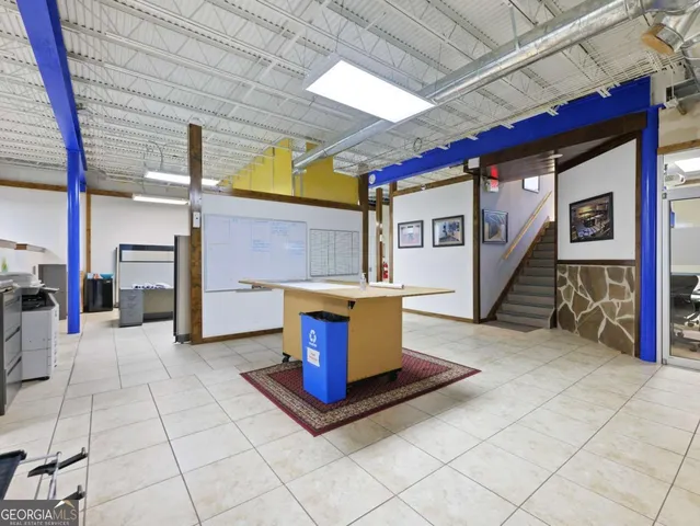 a room with furniture and a window