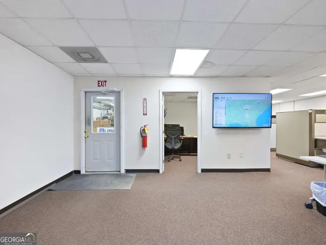 an aerial view of a house with yard swimming pool and outdoor seating