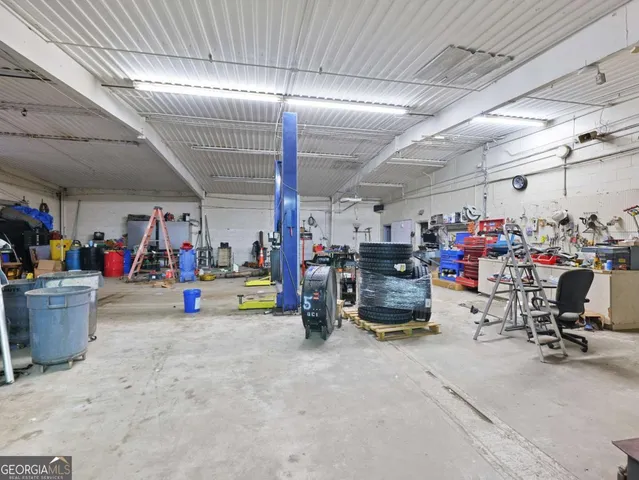 a view of a table and chairs in the patio