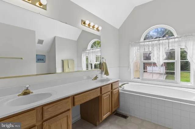 a bathroom with a sink and a bathtub