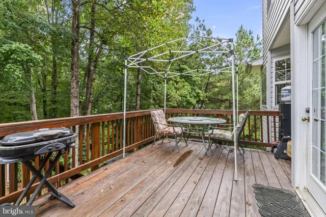 a view of a chairs on the roof deck