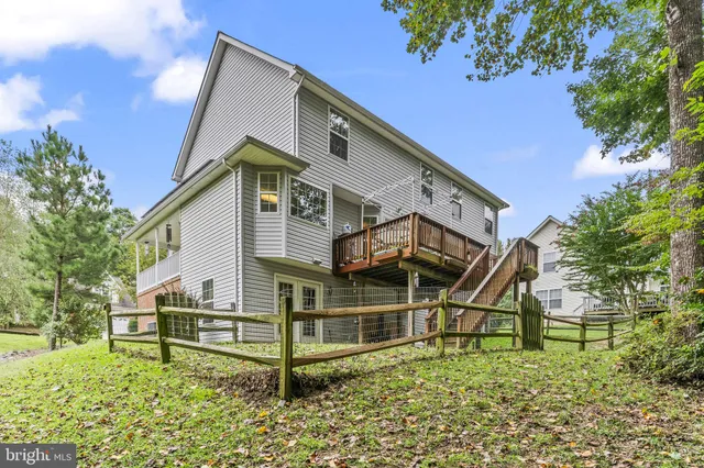 a house with trees in the background