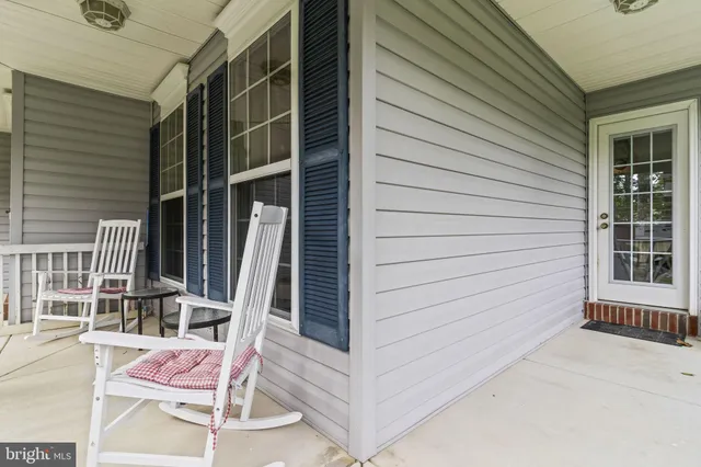 a view of balcony with furniture