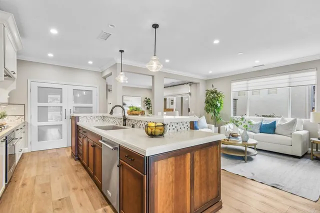 a view of a kitchen counter top space with stainless steel appliances granite countertop furniture and a counter top space