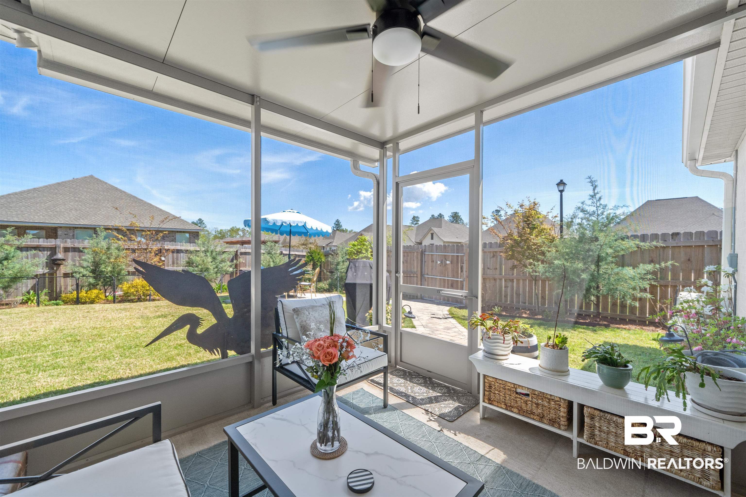 1509 Fenton Circle Foley, AL 36535 - Photo 28 of 34 Sunroom with ceiling fan and a healthy amount of sunlight