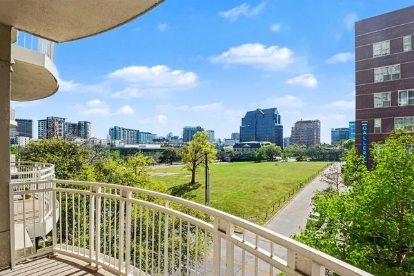 a view of a city from a balcony