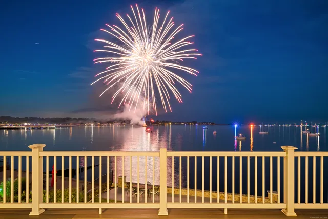 a view of balcony with wooden floor