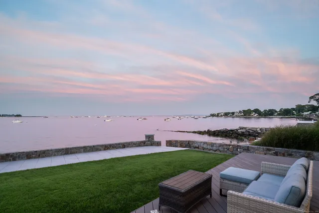 a view of a yard with furniture