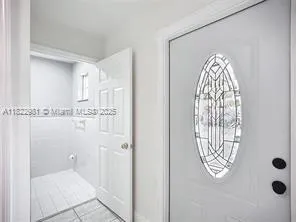 a view of entryway with wooden floor