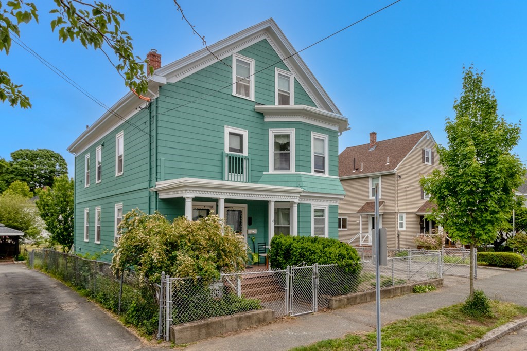 14 Dunlap Street Salem, MA 01970 - Photo 1 of 28 a front view of a house with a yard