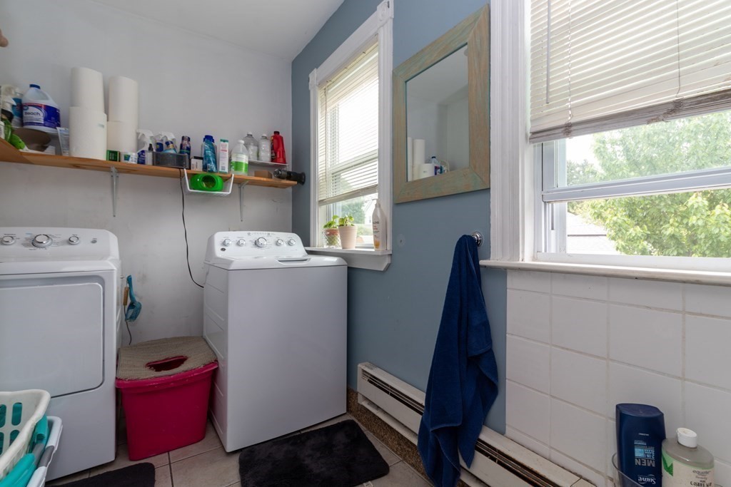 14 Dunlap Street Salem, MA 01970 - Photo 17 of 28 a utility room with dryer and washer