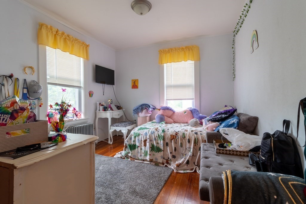 14 Dunlap Street Salem, MA 01970 - Photo 21 of 28 a bed room with bed and a window