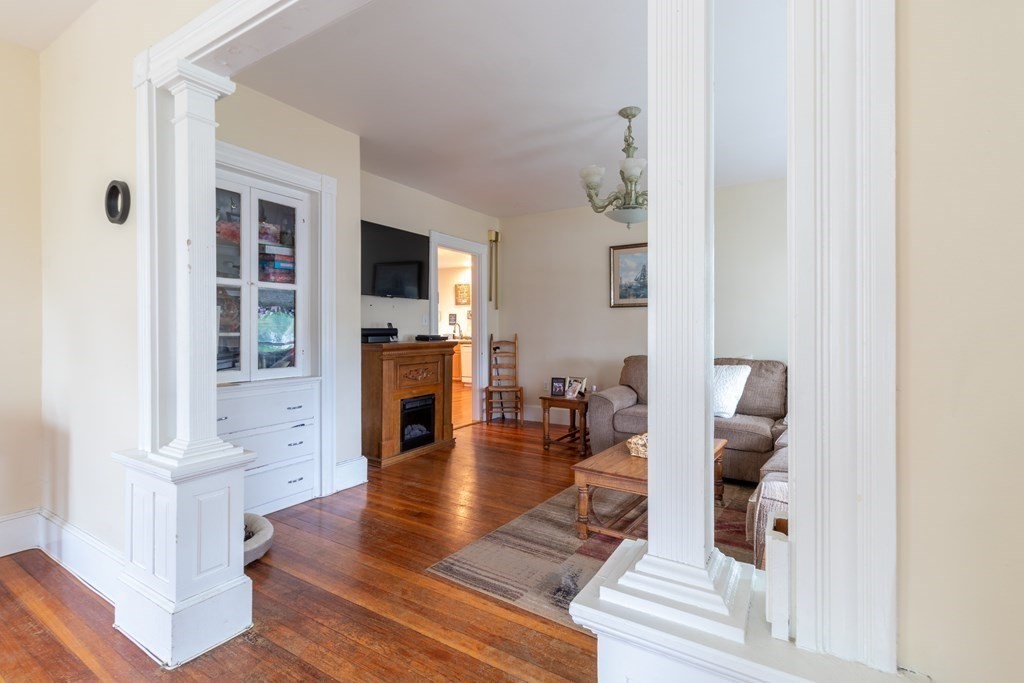 14 Dunlap Street Salem, MA 01970 - Photo 6 of 28 a living room with furniture and a flat screen tv