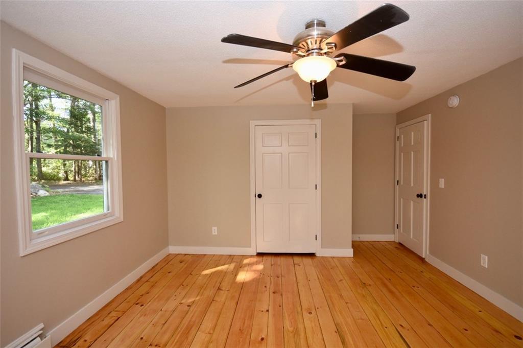 38 Skillin Road Cumberland, ME 04021 - Photo 12 of 17 Front bedroom with ceiling fan.