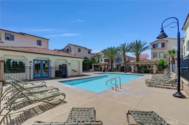 a view of a dinning table and chairs in patio