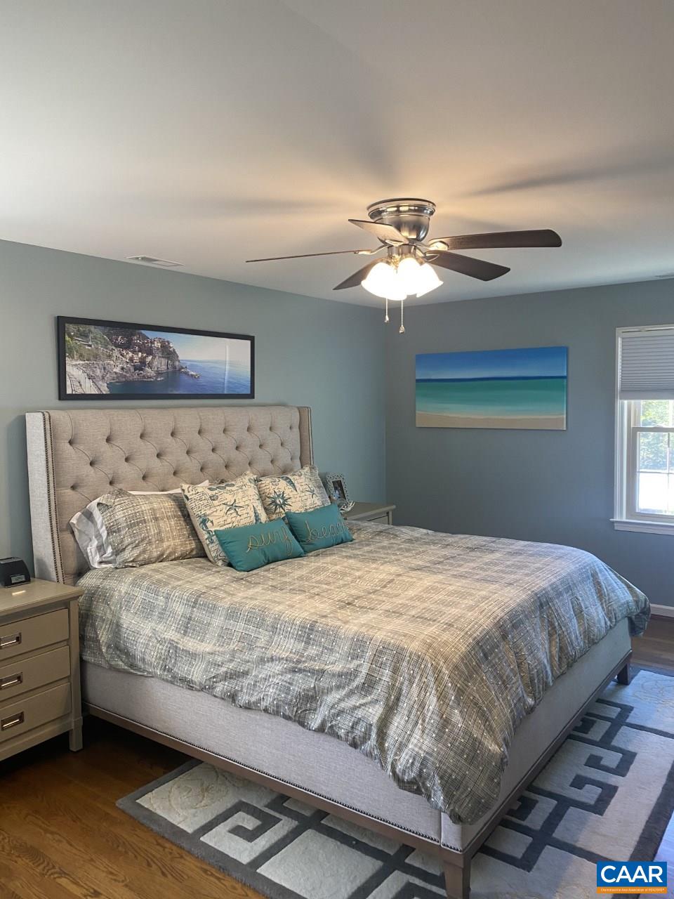 204 Chaucer Road Charlottesville, VA 22901 - Photo 6 of 8 a bedroom with a bed and a ceiling fan