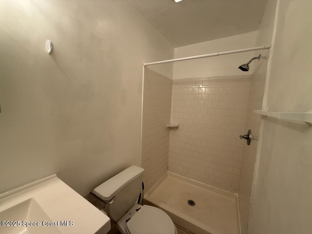 3485 Highway 1, Unit 6 Mims, FL 32754 - Photo 4 of 4 a bathroom with a shower and toilet