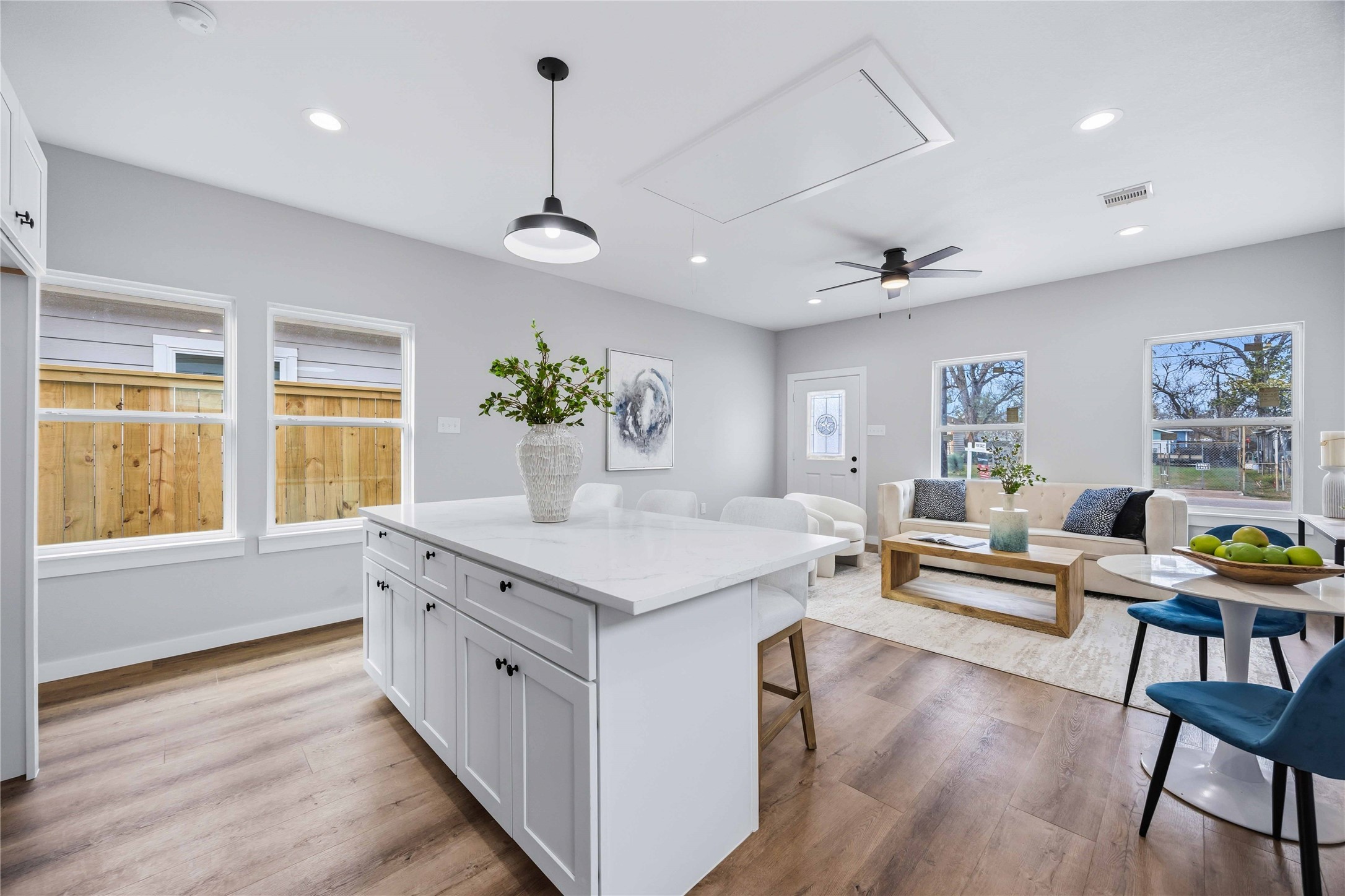 7318 Victoria Street Houston, TX 77020 - Photo 10 of 24 The kitchen is the heart of the home, where a spacious island anchors the space, complemented by quartz countertops.