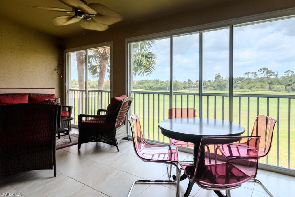 6015 Pinnacle Lane, Unit 5 Naples, FL 34110 - Photo 21 of 25 a view of a dining room with furniture window and outside view