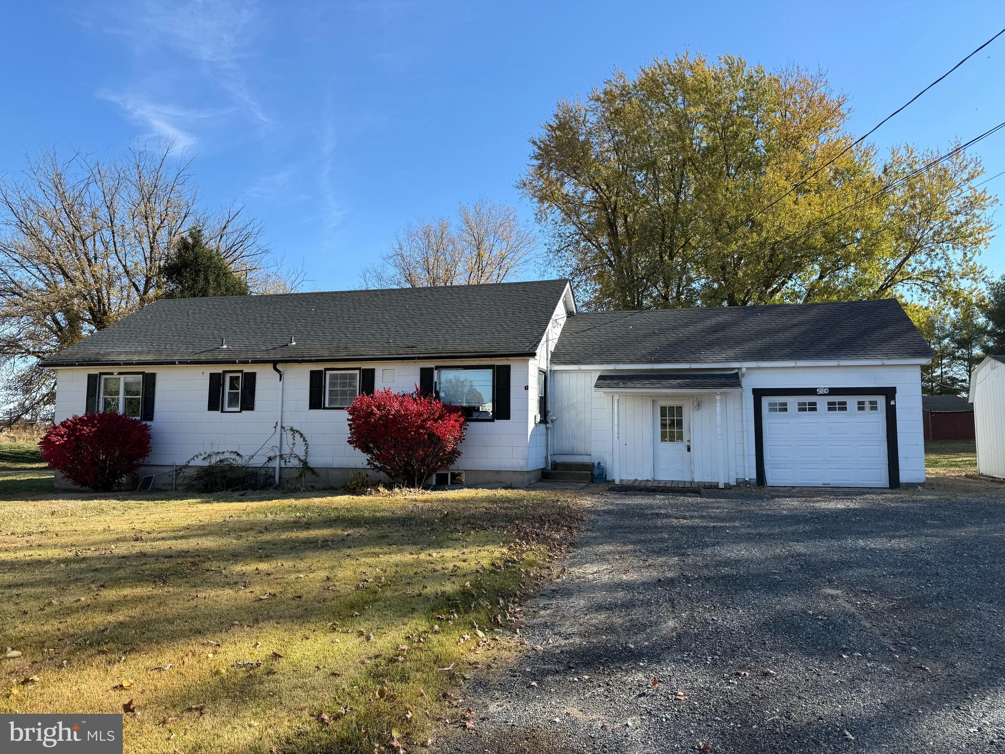 204 Compromise Road Mannington, NJ 08098 - Photo 1 of 25 a front view of a house with yard