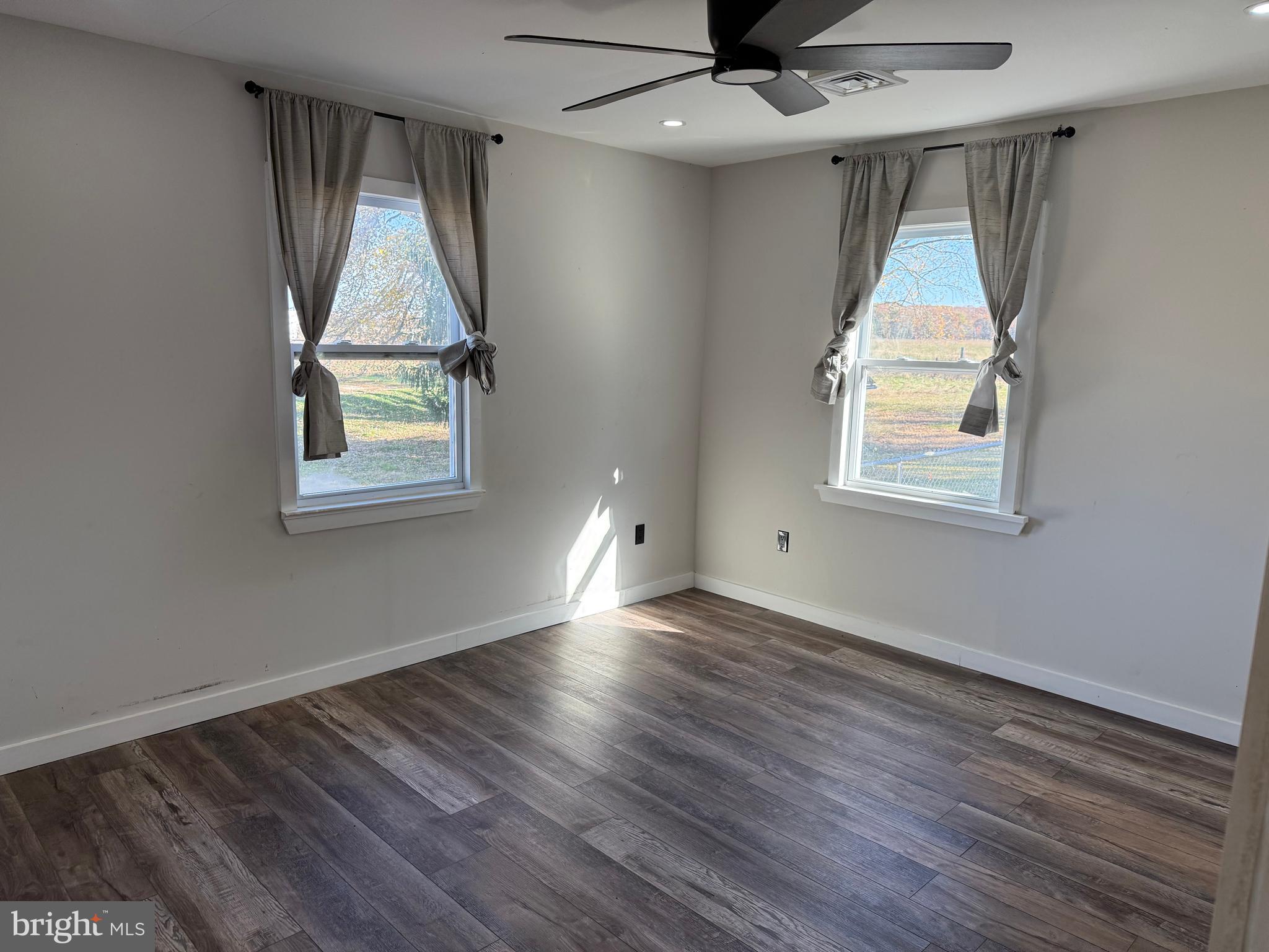 204 Compromise Road Mannington, NJ 08098 - Photo 14 of 25 wooden floor in an empty room with a window