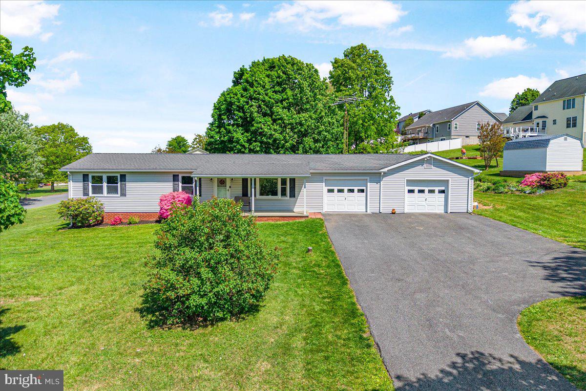 14011 Pryor Road Thurmont, MD 21788 - Photo 1 of 38 a front view of a house with a yard and garage