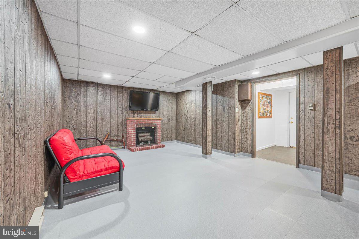 14011 Pryor Road Thurmont, MD 21788 - Photo 28 of 38 a room with furniture and a fireplace