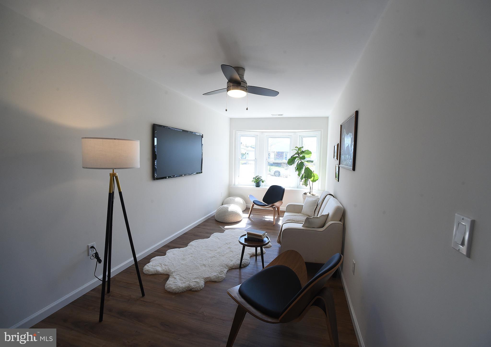 4 Deep Hollow Lane North Columbus, NJ 08022 - Photo 11 of 27 a living room with furniture and a flat screen tv