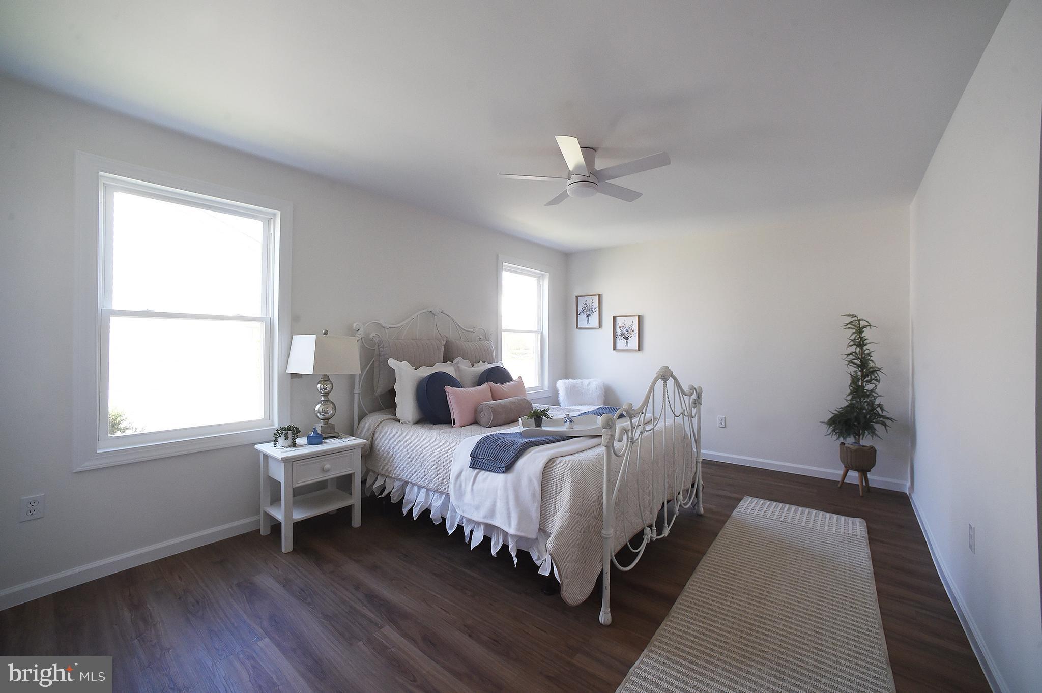 4 Deep Hollow Lane North Columbus, NJ 08022 - Photo 12 of 27 a bed room with a bed and a window