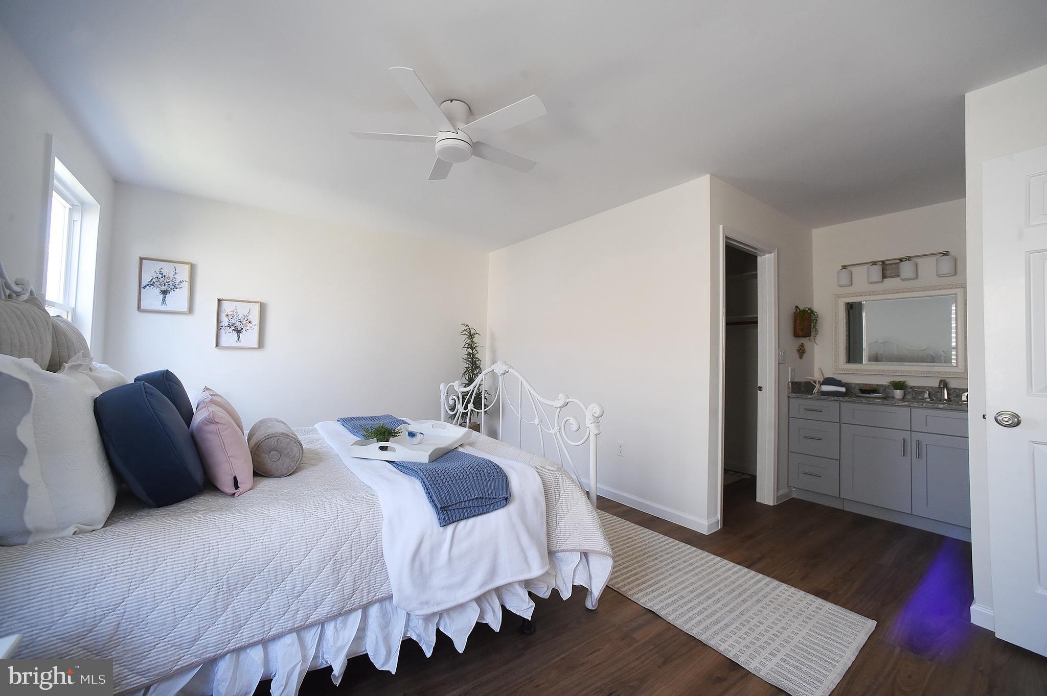 4 Deep Hollow Lane North Columbus, NJ 08022 - Photo 13 of 27 a bedroom with a bed and a view of kitchen