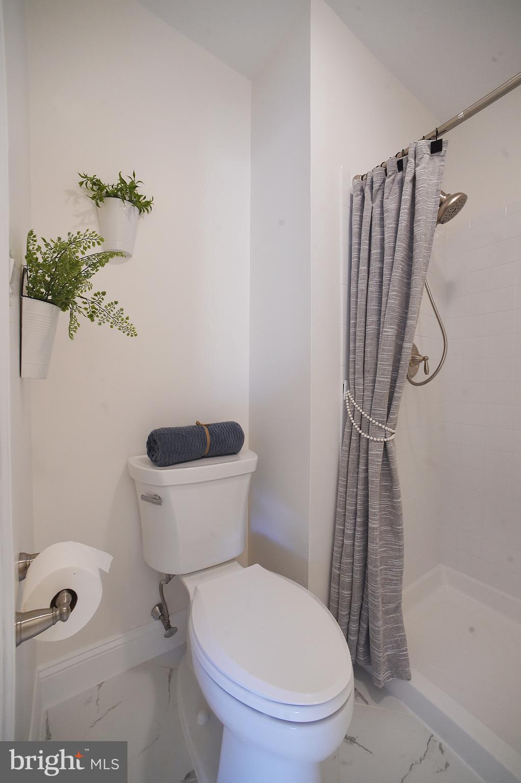 4 Deep Hollow Lane North Columbus, NJ 08022 - Photo 14 of 27 a white toilet sitting next to a shower
