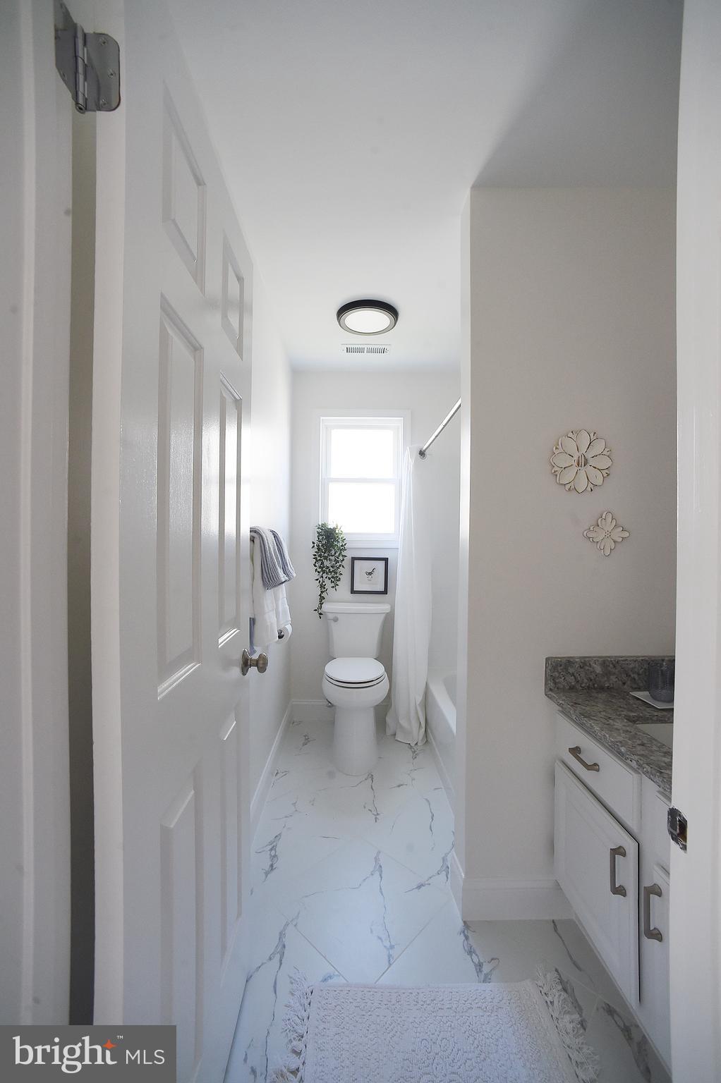 4 Deep Hollow Lane North Columbus, NJ 08022 - Photo 16 of 27 a view of a hallway with bathroom