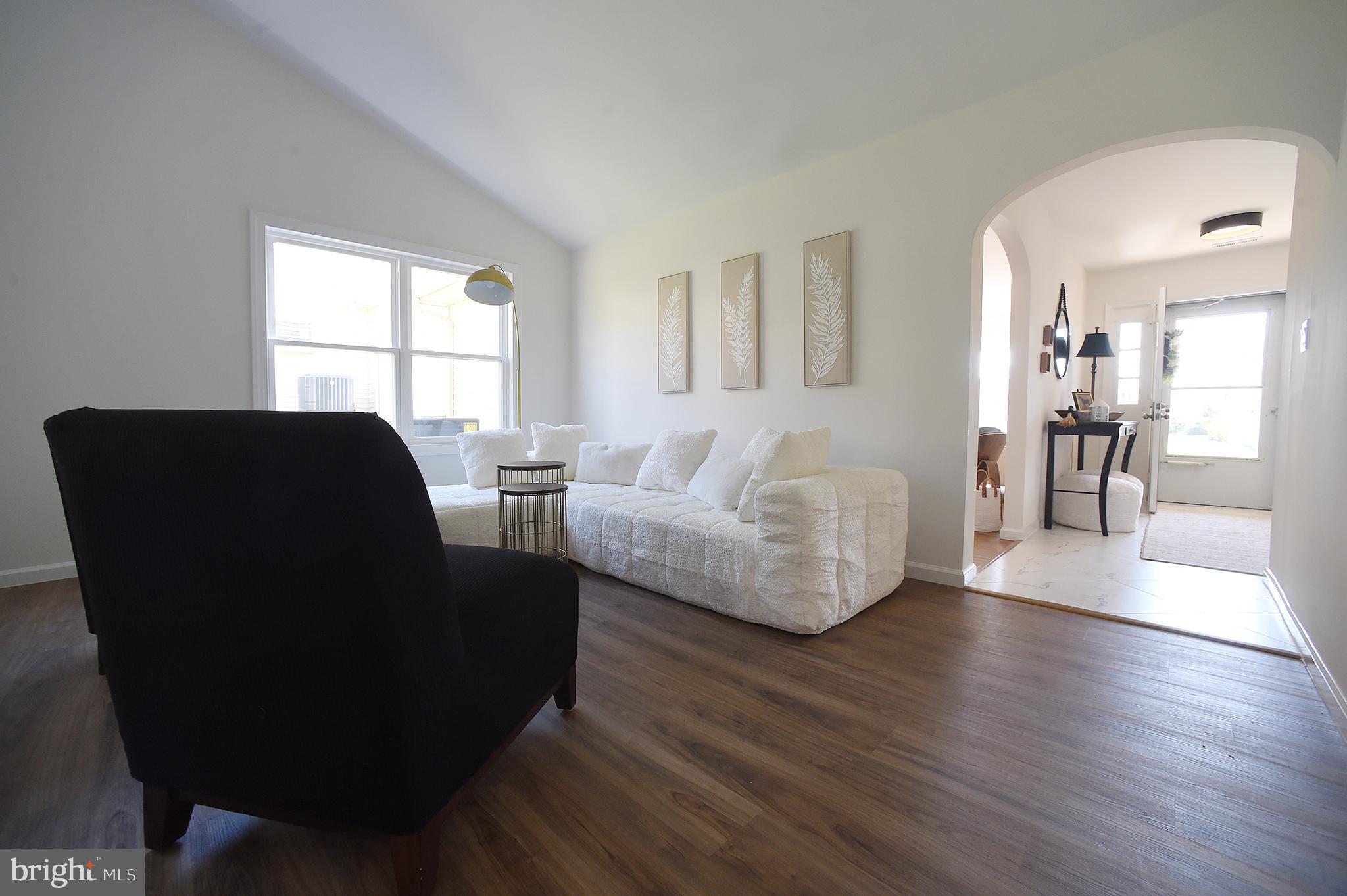 4 Deep Hollow Lane North Columbus, NJ 08022 - Photo 20 of 27 a living room with furniture and a large window