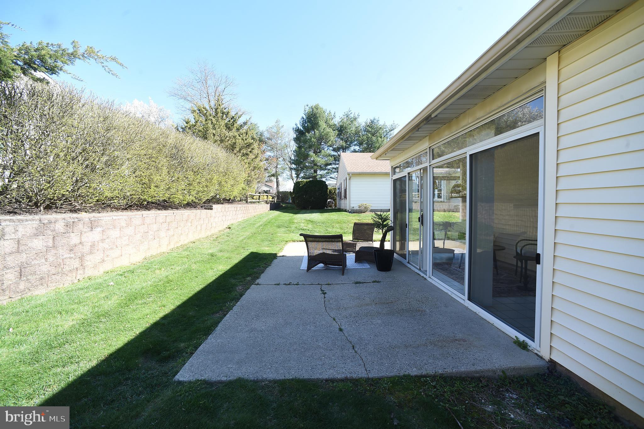 4 Deep Hollow Lane North Columbus, NJ 08022 - Photo 25 of 27 a view of a backyard with sitting area